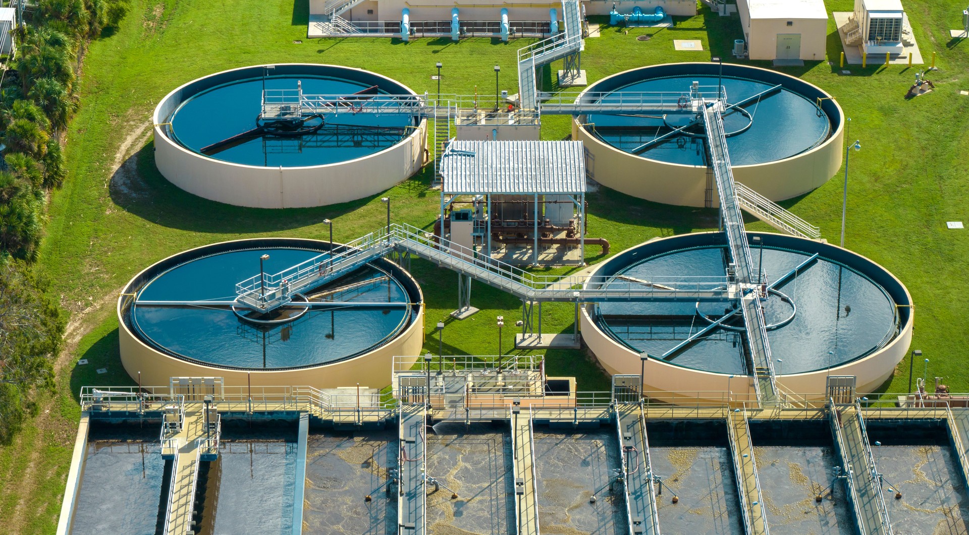 Aerial view of water treatment factory at city wastewater cleaning facility. Purification process of removing undesirable chemicals, suspended solids and gases from contaminated liquid